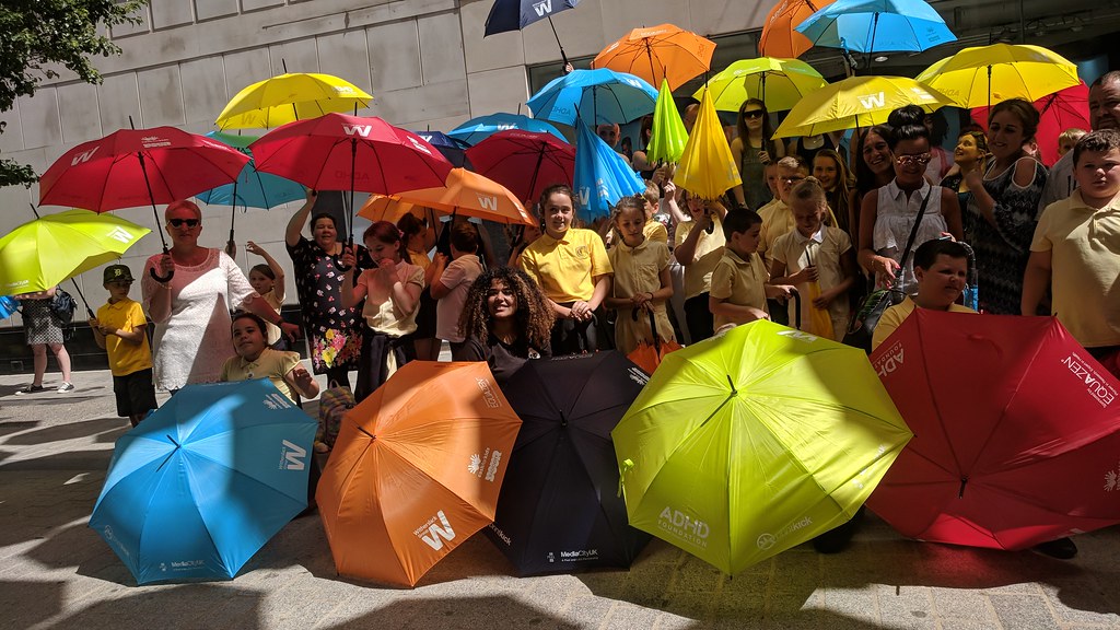 ADHD people with umbrellas of varied colors